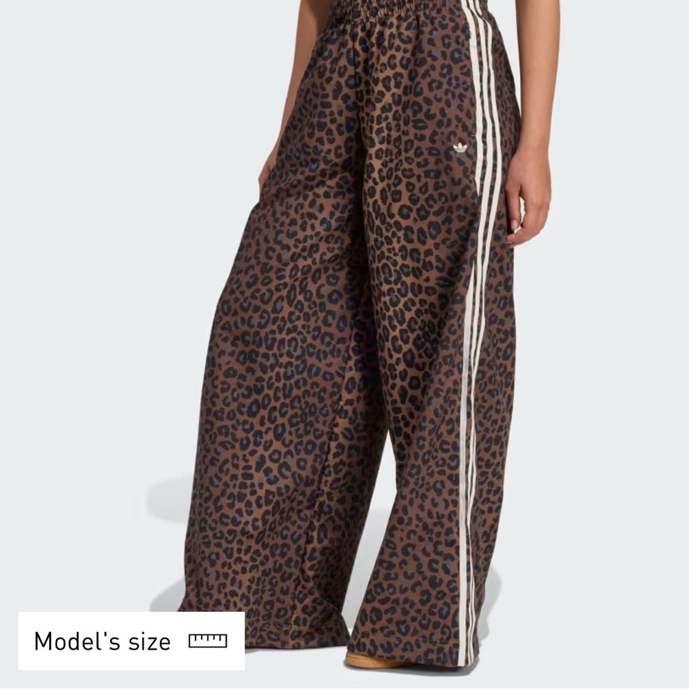 ISO Adidas print firebird pants, women size L